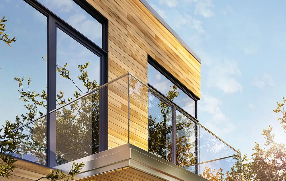 Symbolbild Glasversicherung: Haus mit großen Fenstern.
